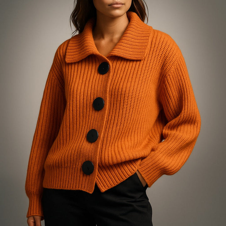 Oversized chunky knit cardigan with collar in orange, worn, front view