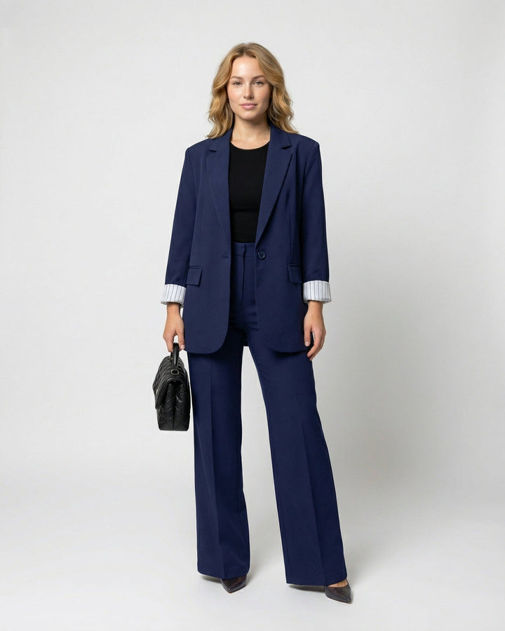 Trouser suit with tailored blazer and wide-leg trousers in navy, worn, front view