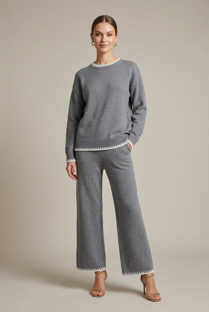 Grey two-piece lounge set with oversized jumper and wide-leg trousers