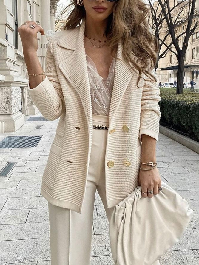 Knitted double-breasted blazer with gold-coloured buttons in cream, worn, front view