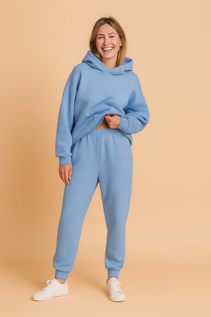 Light blue oversized hoodie and joggers tracksuit, worn, front view