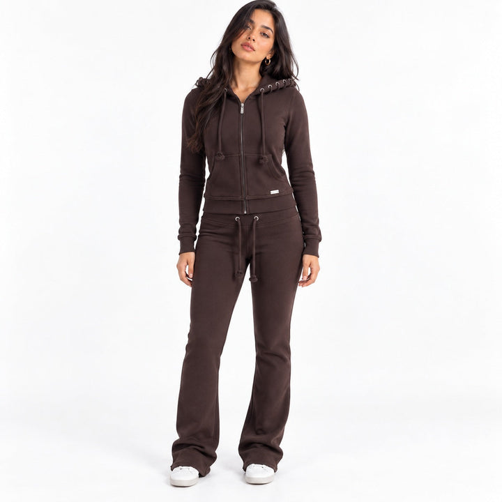 Knitted zip-up hoodie and flared trousers in dark brown, worn, full-length front view