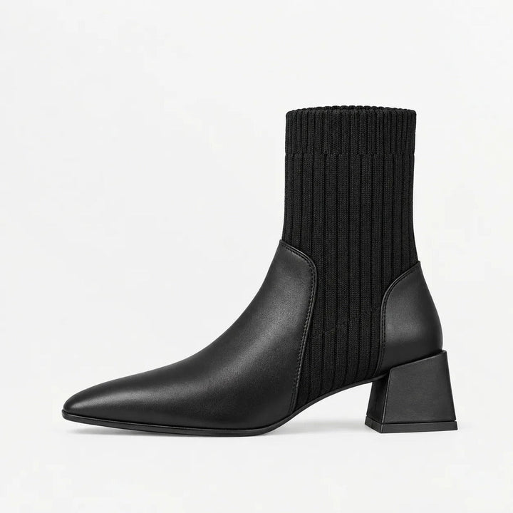 Black Chelsea boot with ribbed knit shaft, square toe and block heel