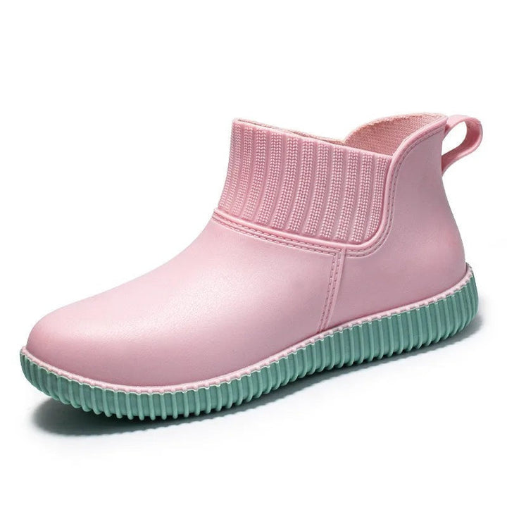 Waterproof rain shoes with knit collar in pink, product photo, side view