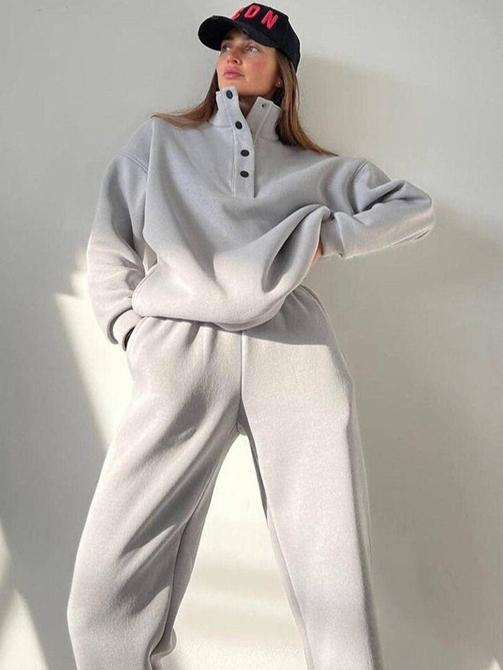 Grey fleece lounge set with snap-button collar, front view