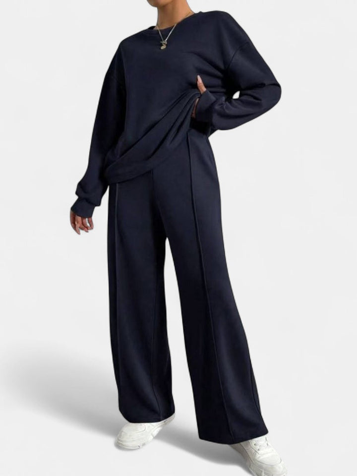 Navy lounge set with crew-neck sweatshirt and wide-leg seamed trousers, front view