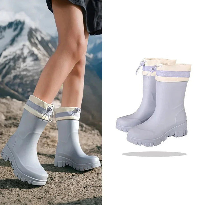 Wellies with drawstring cuff in light blue, mid-calf, worn and product photo