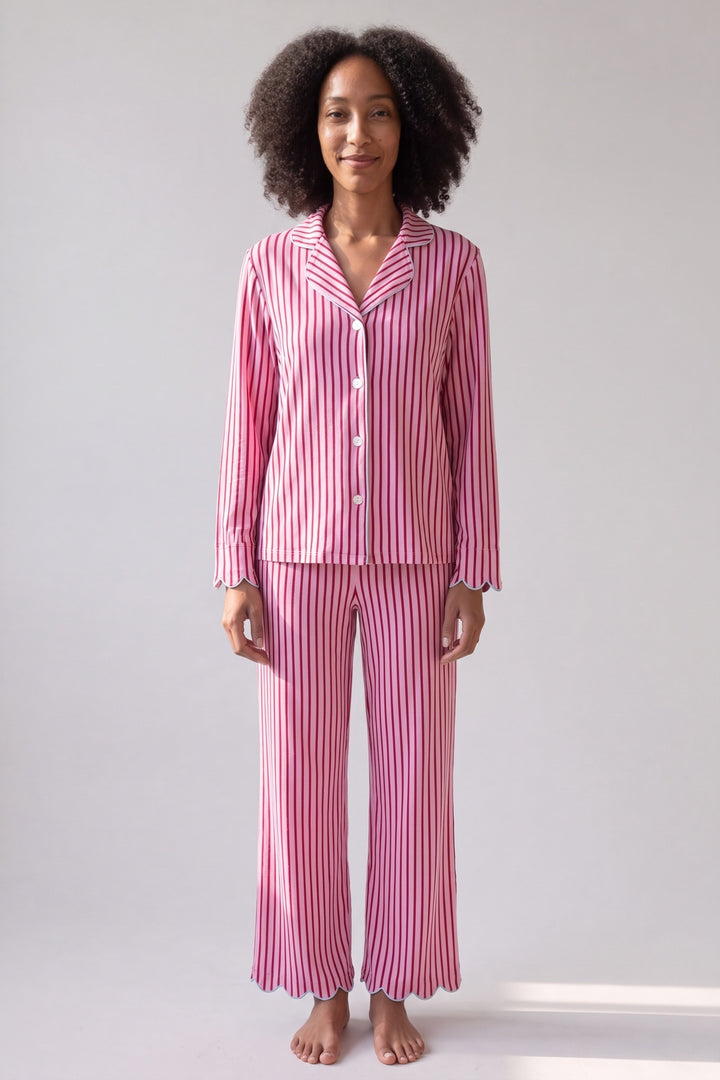 Pink and red candy-stripe pyjamas, worn, front view