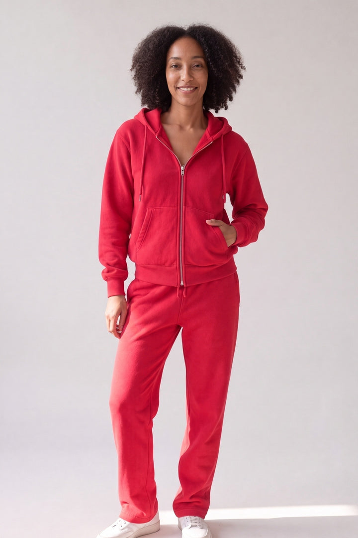 Red full-zip fleece hoodie and straight-leg trousers, worn, front view