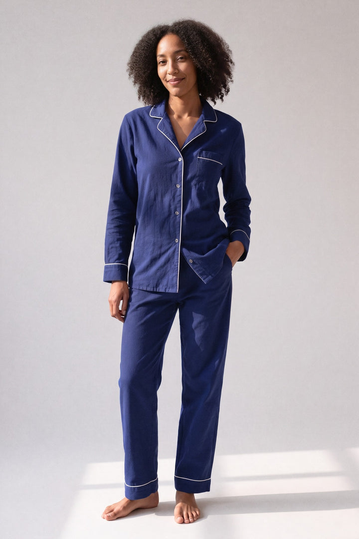 Navy cotton flannel pyjamas with white piping, worn, front view