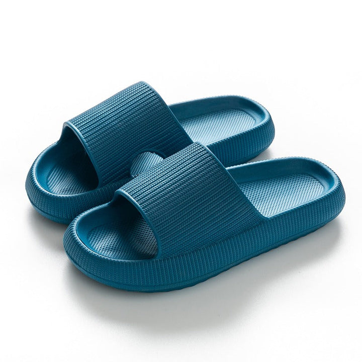 Teal blue textured rubber slide sandals with thick cushioned soles, unworn pair | Grace Aura
