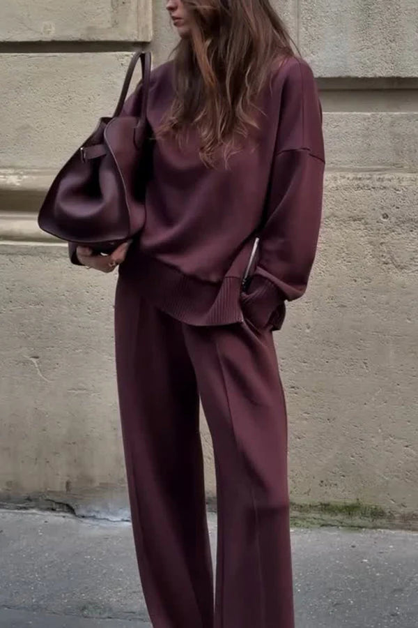 Burgundy oversized sweater and wide-leg pants set worn by woman outdoors | Grace Aura