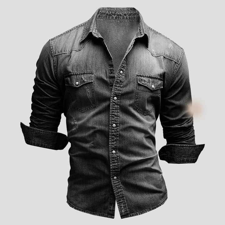 Black faded denim button-up shirt with chest pockets, worn by model | Grace Aura