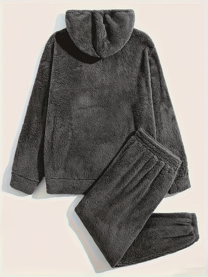 Dark grey fleece hoodie and sweatpants set laid flat | Grace Aura