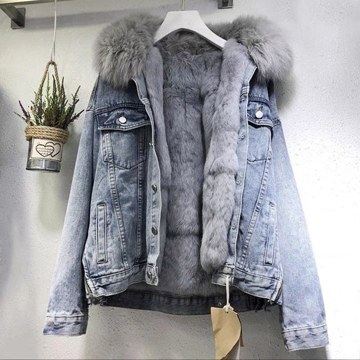 Light blue denim jacket with gray faux fur hood, hanging display | Grace Aura