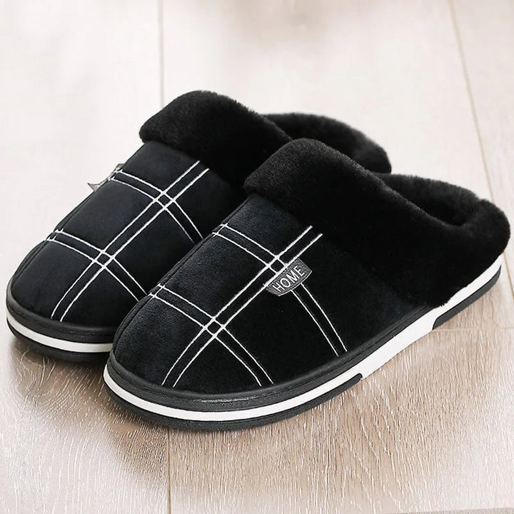 Black plaid faux-fur lined slippers with white sole, shown flat unworn | Grace Aura