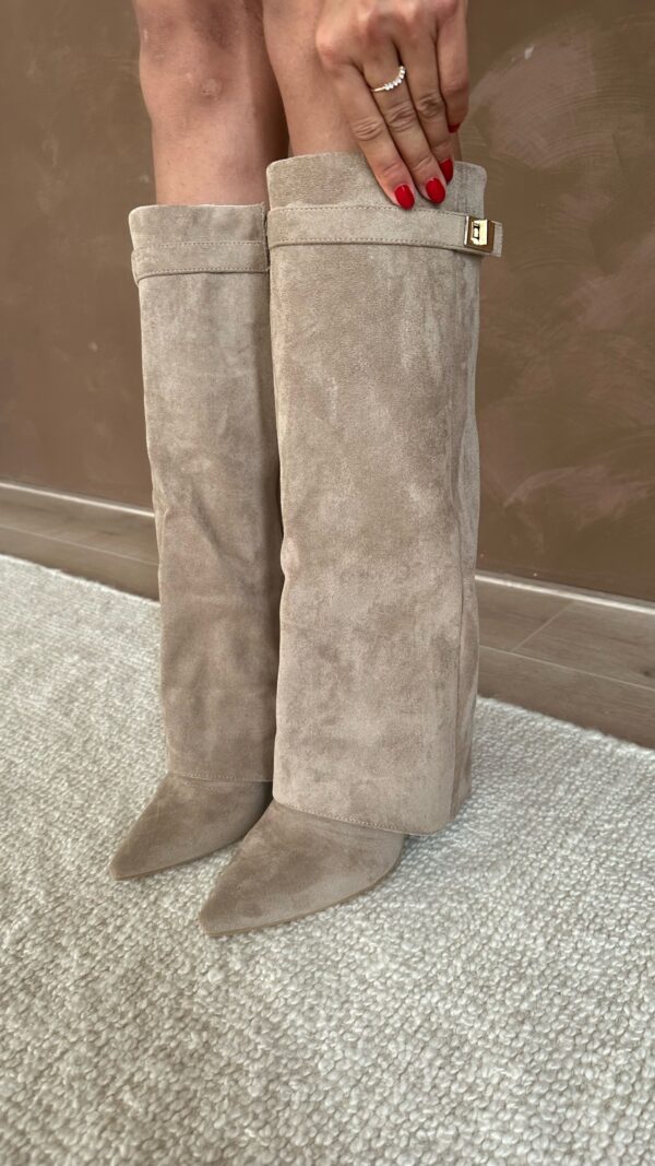 Taupe suede knee-high pointed-toe boots with gold buckle detail, worn by model | Grace Aura
