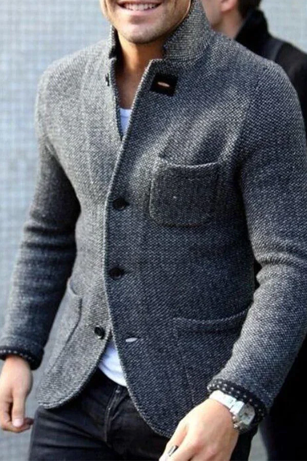 Gray knitted button-up cardigan jacket with pocket, worn by smiling man | Grace Aura