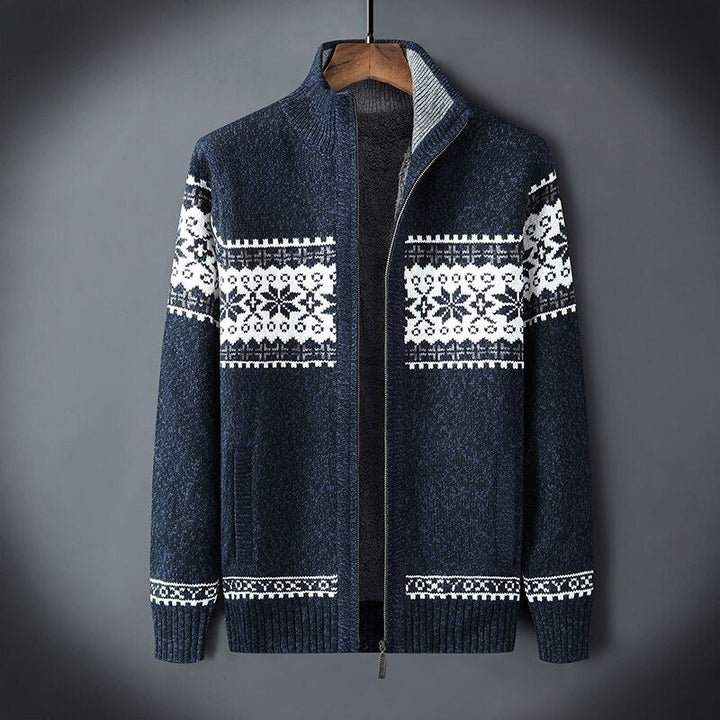Navy knit zip-up cardigan with white snowflake pattern, shown on hanger | Grace Aura