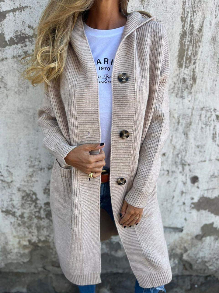 Beige knitted hooded button-up cardigan worn by woman with jeans | Grace Aura