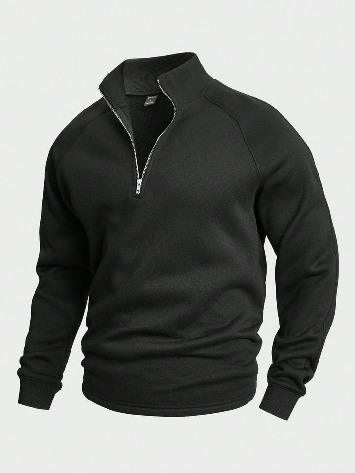 Black quarter-zip pullover sweatshirt with ribbed collar, worn by model | Grace Aura