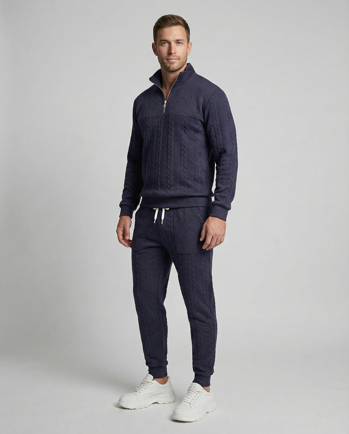 Man wearing navy cable-knit quarter-zip top and jogger sweatpants set | Grace Aura