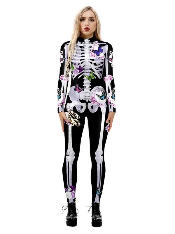 Woman wearing black skeleton print catsuit with floral butterfly accents, platform boots | Grace Aura