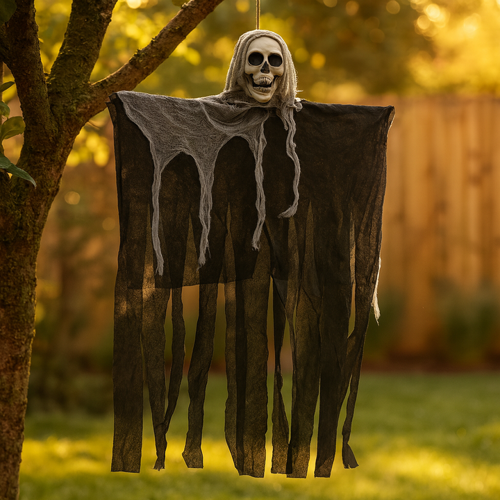 Hanging skull skeleton decoration with black tattered fabric, outdoor tree display | Grace Aura