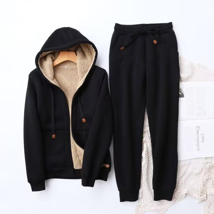Black fleece-lined zip hoodie and jogger sweatpants set, flat lay | Grace Aura