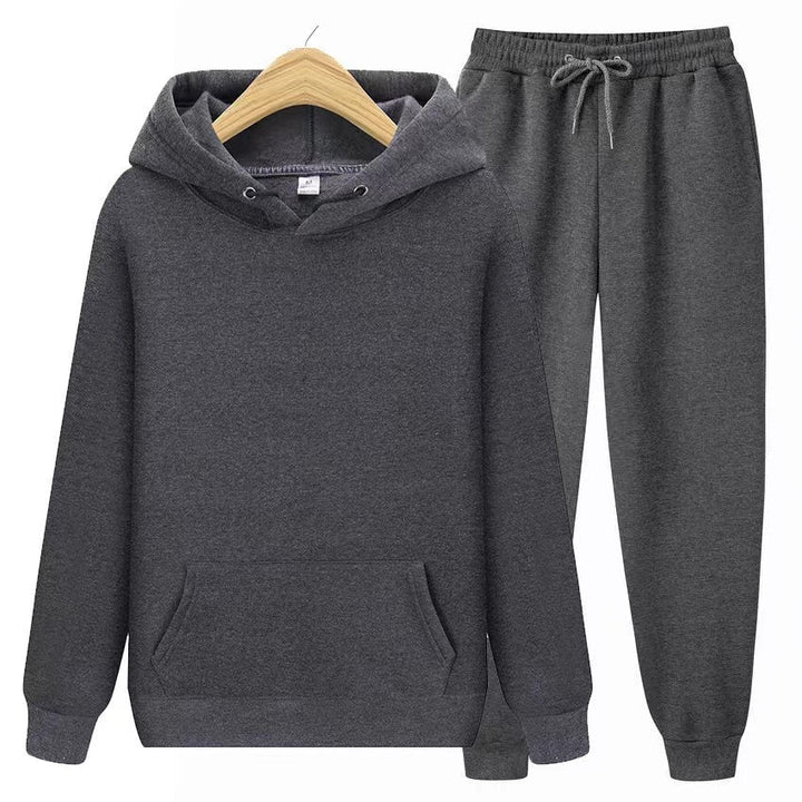 Dark gray fleece hoodie and jogger sweatsuit set on hanger | Grace Aura