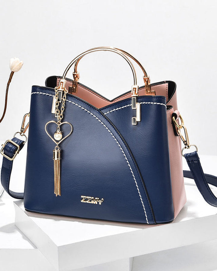 Navy blue and pink leather tote bag with metal handles | Grace Aura