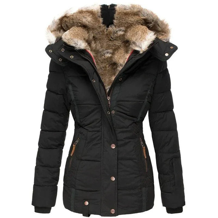 Black quilted puffer coat with faux fur hood, worn by mannequin | Grace Aura