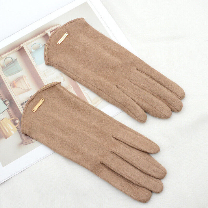 Camel suede gloves with gold accent, laid flat on background | Grace Aura