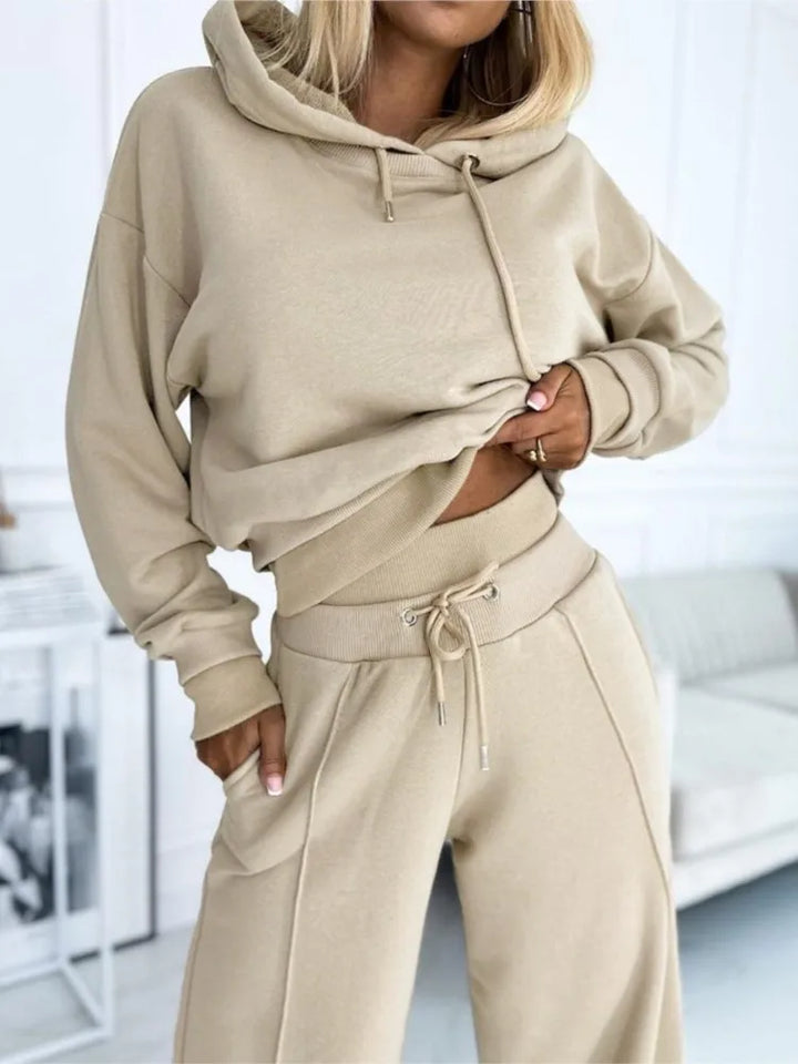 Beige oversized hoodie and wide leg joggers set worn by woman | Grace Aura