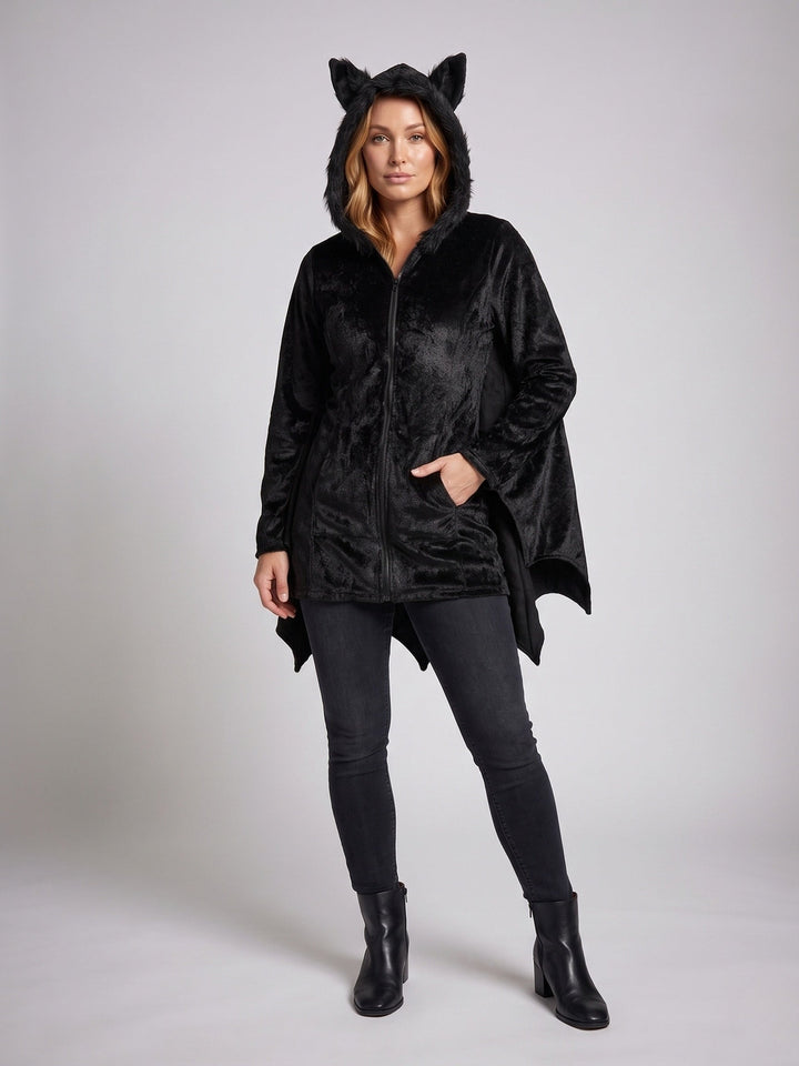 Woman in a black plush bat costume jacket with hood and ears