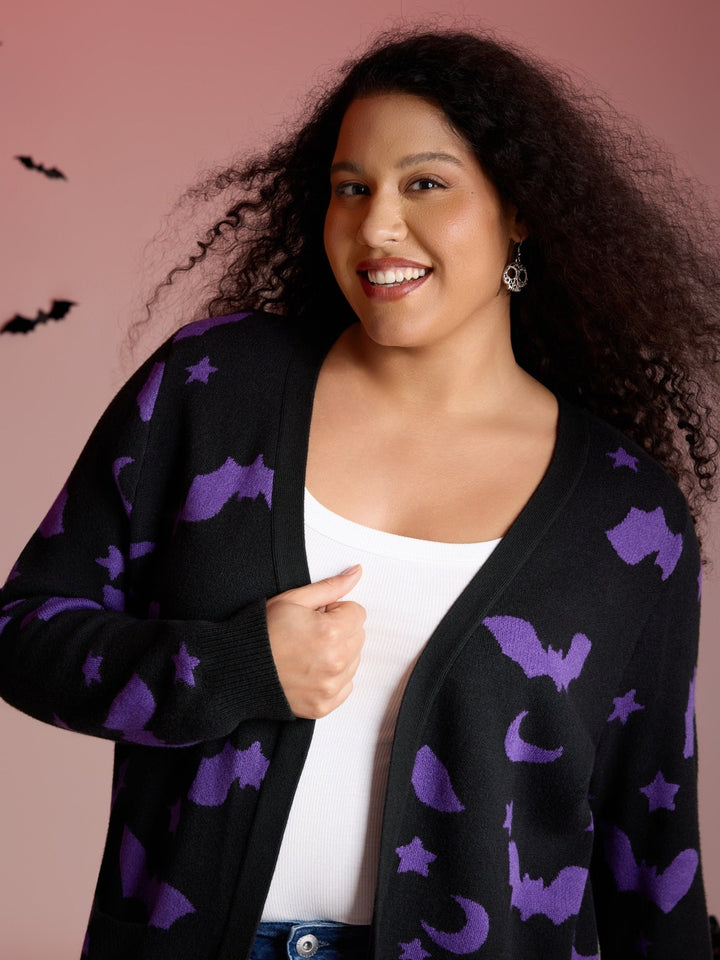 Woman in the black cardigan with purple bats, close-up