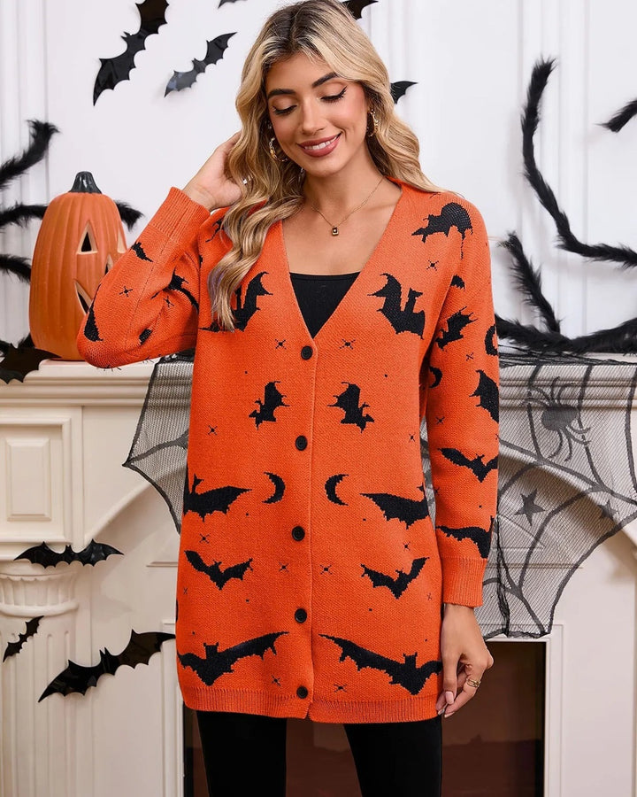 Orange cardigan with black bats and moons, buttoned