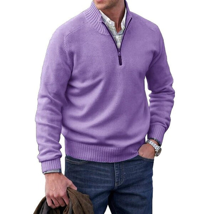 Purple quarter zip jumper over a white shirt