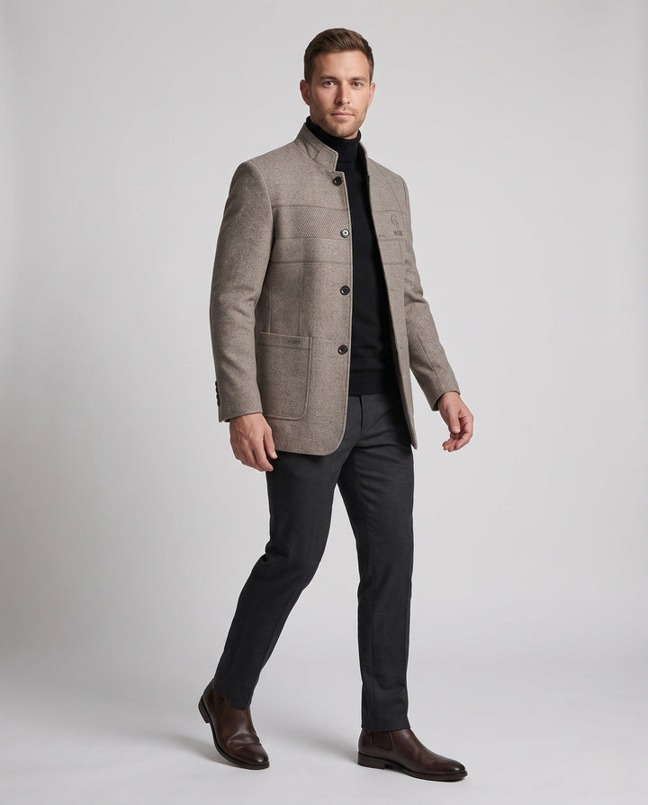 Men's light brown wool-blend jacket with a stand collar worn with dark trousers
