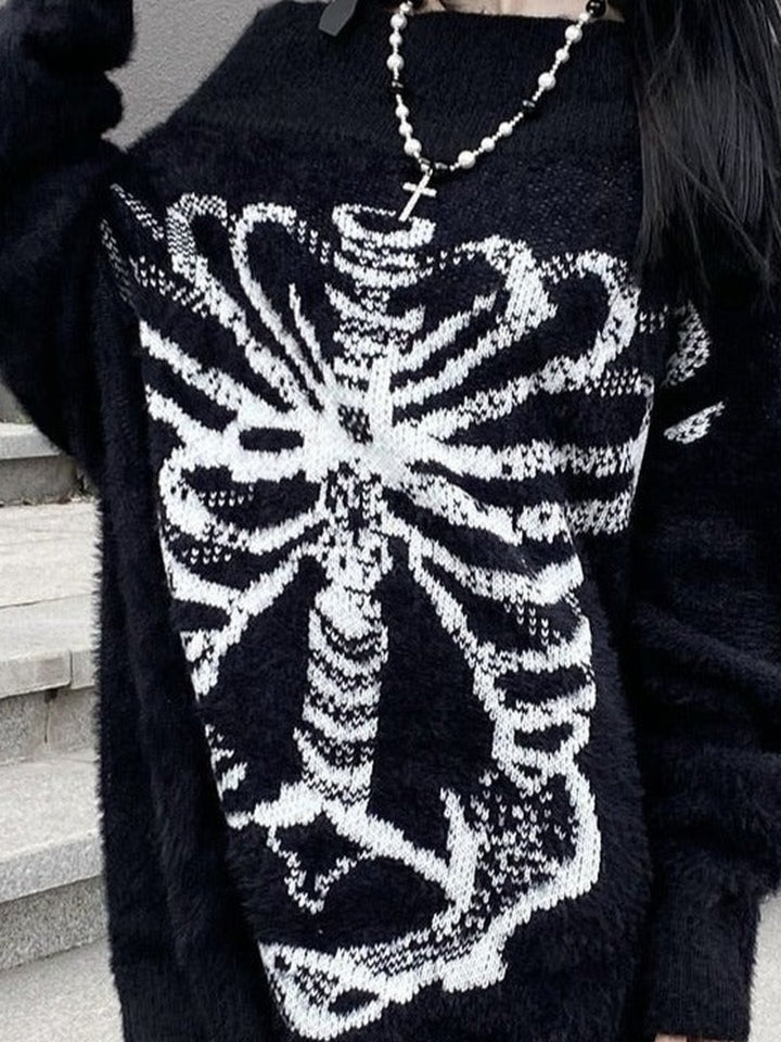 Close-up of the skeleton ribcage pattern on the fluffy black jumper