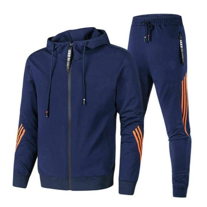 Navy blue hooded tracksuit with orange stripes, jacket and pants, flat lay | Grace Aura