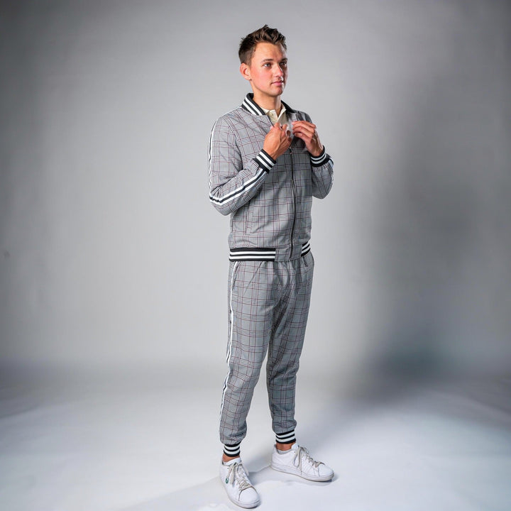 Man wearing gray plaid tracksuit with zip jacket and matching joggers | Grace Aura