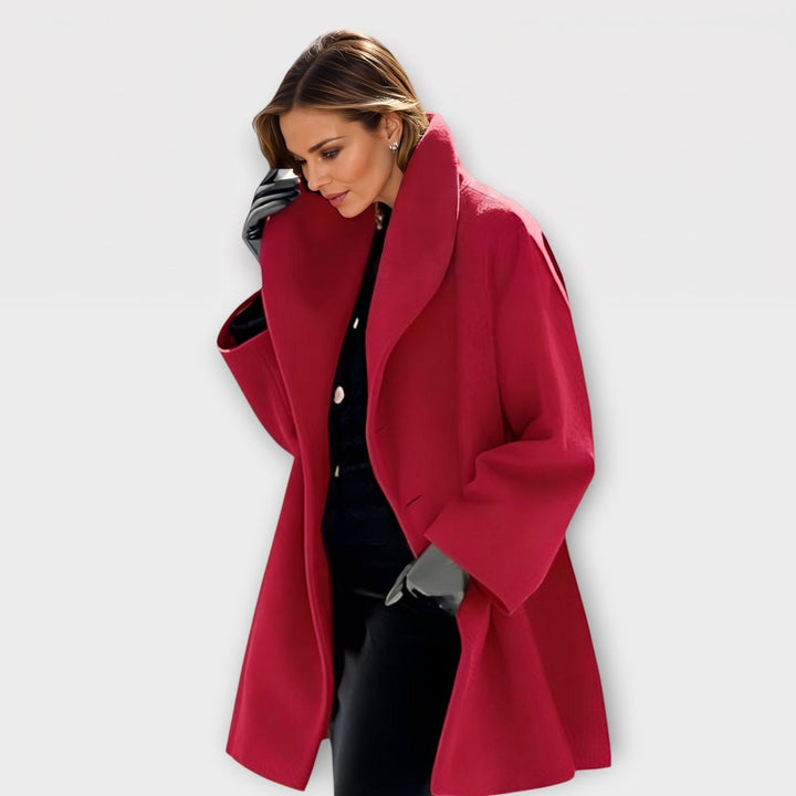 Red shawl collar coat worn by woman with black outfit underneath | Grace Aura