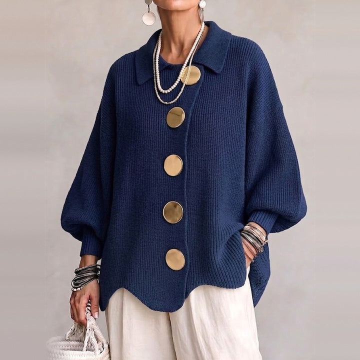 Navy blue oversized cardigan with gold buttons, worn by woman with accessories | Grace Aura