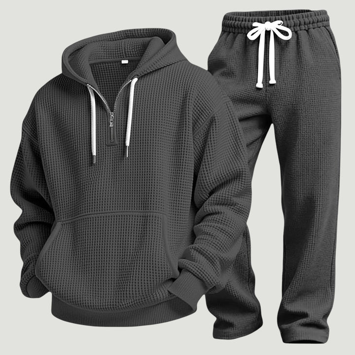 Dark gray waffle-knit half-zip hoodie and jogger set, flat lay | Grace Aura