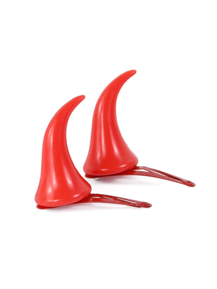 Pair of red devil horns on hair clips