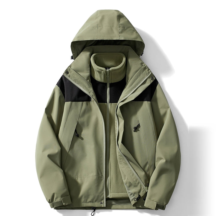 Green hooded jacket with black panel, laid flat, zipper open | Grace Aura