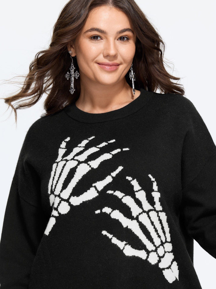 Woman in the black jumper with white skeleton hands, close-up
