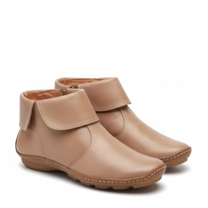 Beige ankle boots with fold-over cuff and side zip