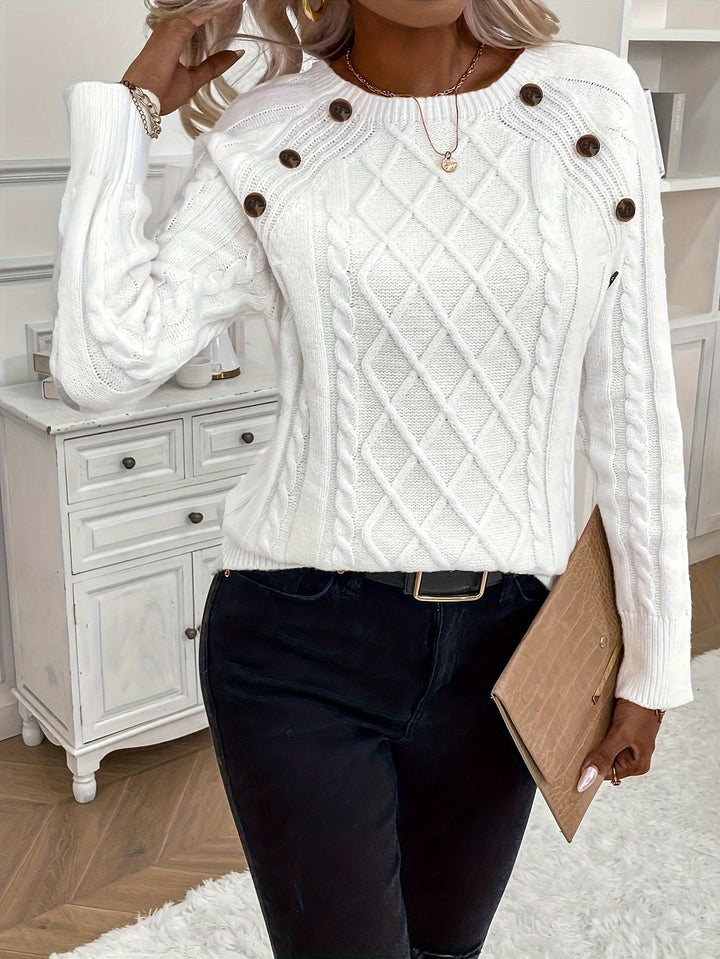 White cable knit sweater with button shoulder detail, worn by woman | Grace Aura